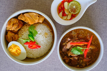 Traditional Thai  Chicken and gravy with rice and egg