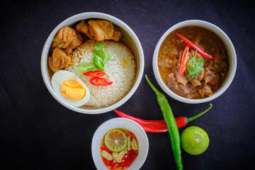 Traditional Thai  Chicken and gravy with rice and egg