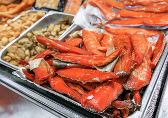 Smoked candied salmon fillet for sale at the famous farmer's market in Seattle, Washington