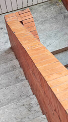 Stair steps with brick orange barriers - interior design loft retro 
