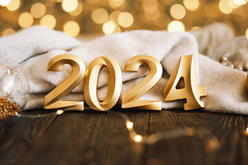 Happy New Years 2024. Christmas background with Christmas tree, cones and Christmas decorations....