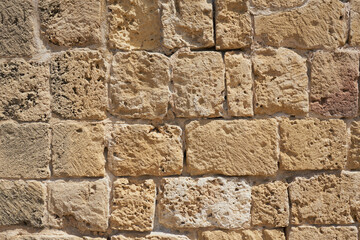 The wall is made of stones as a decorative background.