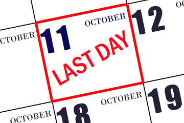 Text LAST DAY on calendar date October 11. A reminder of the final day. Deadline. Business concept.