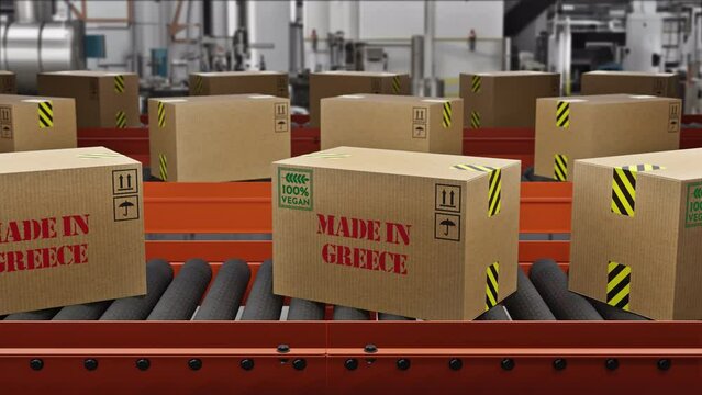 Vegan Food Cargo Boxes MADE IN GRECEE Text on Roller Conveyor