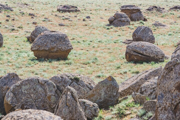 Unusual spherical shape of stones in the Kazakh steppe Mangistau, valley of balls in nature Torysh