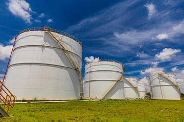 Tank farm in industry Thailand with white oil and petrol silos