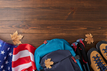 Embarking on a hike to revel in the autumnal colors. Top view flat lay of american flag, trekking...