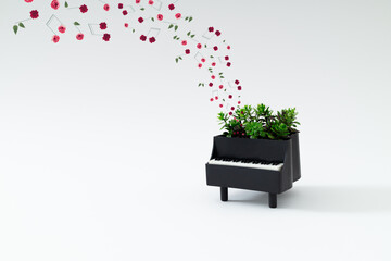 Creative composition of piano and musical notes made of various flowers on white background....