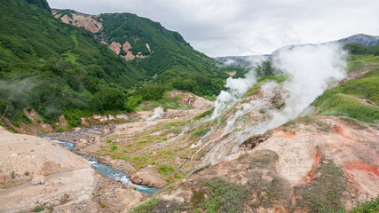Fototapeta na wymiar Russia. Kamchatka. The mountains and the Valley of Geysers.