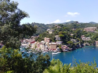 Fototapeta na wymiar Aerial panoramic view of picturesque harbour of Portofino fishing village on the Italian Riviera, Liguria, Italy