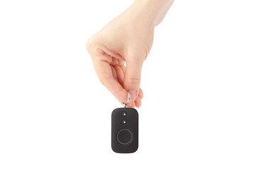 car alarm remote control in hand isolated, modern anti-theft system