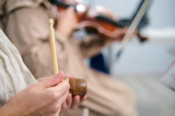 Closeup on the musical instrument bring life to the classical piece being performed by the...