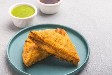 Delicious bread pakora with sweet & sour chutney and hot tea