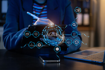 Agile development methodology concept. Business hand using laptop computer and tablet with virtual...