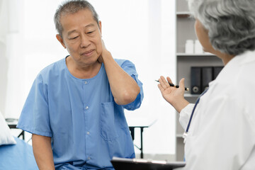 Fototapeta premium Concerned senior old patient, patient talks with healthcare professional.