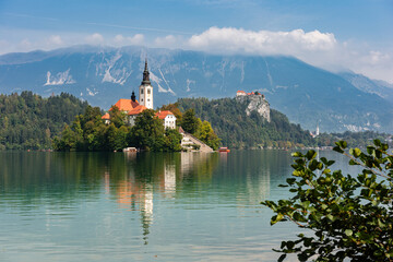 Lake Bled (Blejsko jezero) Slovenia. Beautiful mountain lake with small Pilgrimage Church. Most...