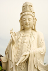 Fototapeta na wymiar Marble statue of Guan Yin, one of the Buddha's incarnations.