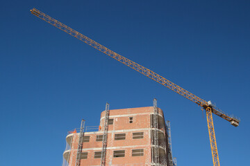 New Apartment Building Under Construction with Tower Crane - 655210498