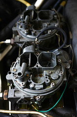 Twin carburetors of combustion engine cars That is becoming rare these days.