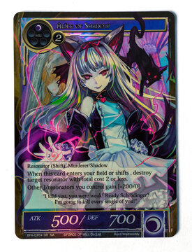 Hamburg, Germany - 01212023: photo of the english Force of Will waifu card Alice of Shadow from the Battle for Attoractia set on white paper background.