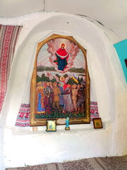 Ancient icons and paintings on biblical themes of the thousand-year-old St. Michael rock-cave monastery.