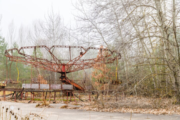 Carousel in abandoned amusement park in a ghost town Pripyat, Ukraine. Chornobyl exclusion zone
