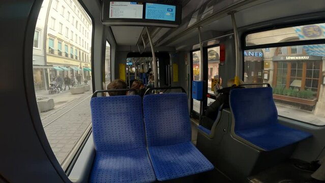 Munich. Germany. Interior of streetcar in Munchen Deutschland. Inside tram with blue seats in Muenchen. Public transportation in Bavaria. Strassenbahn in Munchen. Tramway MVG. 