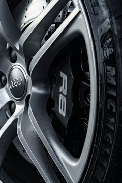 Audi R8 Wheel with focus on Brake Caliper with R8 Inscription, cinematic view and portrait photo