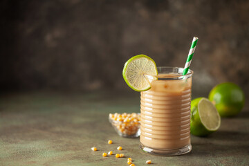 Tejuino traditional mexican drink with corn and lime - obrazy, fototapety, plakaty