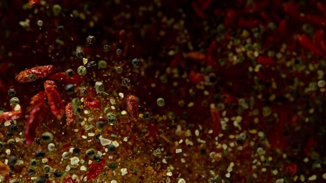 Super Slow Motion Shot of Seasoning Explosion on Black Background at 2000fps.