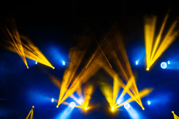 Colorful concert lights on empty stage