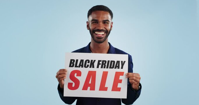 Man, excited and poster sign for Black Friday sale in mockup, discount and promotion or deal. Happy black person, portrait and cheap retail prices from marketing, advertising and commercial on board