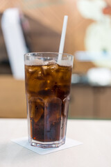 Soft drink glass with ice. Close up