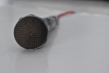 Zoom microphone photo lying on a white table