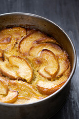 rustic apple cake in baking tin