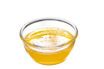 cup of golden butter isolated