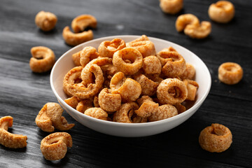 Crispy Pork crackling, scratchings. deep fries in white bowl