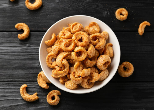 Crispy Pork crackling, scratchings. deep fries in white bowl