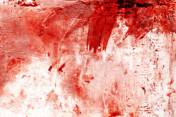 Red blood on old wall for halloween concept. Grunge scary red concrete. Red paint on concrete wall.