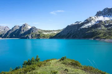 Fototapeten Lünersee Berglandschaft mit türkisem Bergsee in den Alpen im Vorarlberg Österreich Europa © Mrql