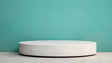 Round Stone Podium in front of a turquoise Studio Background. White Pedestal for Product Presentation