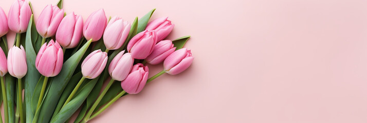 ROMANTIC HOLIDAY BACKGROUND WITH A BOUQUET OF FRESH TULIP FLOWERS ON A SOFT PINK BACKGROUND WITH COPY SPACE. AI generated