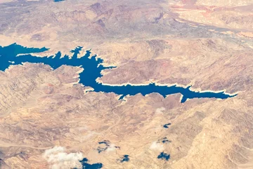 Fotobehang Aerial Photograph of the Boulder Canyon portion of the Colorado River on the Border btw Nevada and Arizona featuring Bighorn Cove, bearing point, flamingo reef, Auxiliary Point and Hamblin Bay  © John McAdorey
