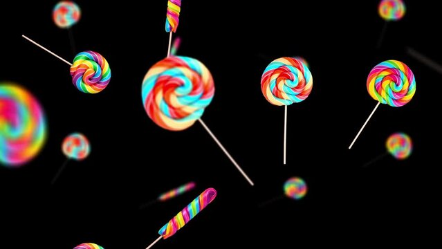 Falling Christmas spiral lollipops  on black background. Christmas concept 