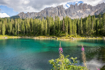Carezza lake on a sunny day, Italy. - 655327610