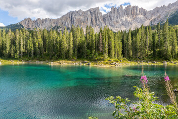 Carezza lake on a sunny day, Italy. - 655327630