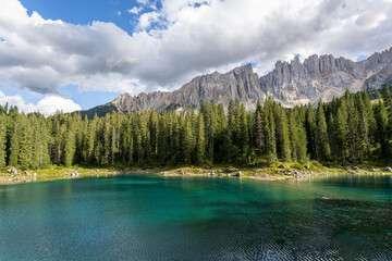 Carezza lake on a sunny day, Italy. - 655327689