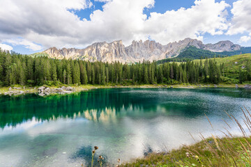 Carezza lake on a sunny day, Italy. - 655328276