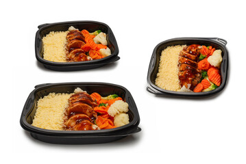 Ready food in a container. Stewed chicken in teriyaki sauce, stewed carrot, cabbage and porridge.