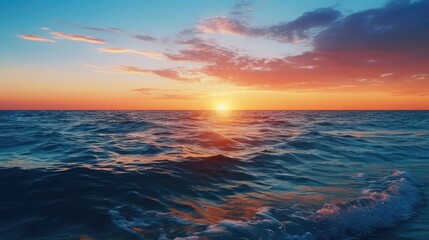 Fototapeta premium sunset over the beautiful deep blue ocean